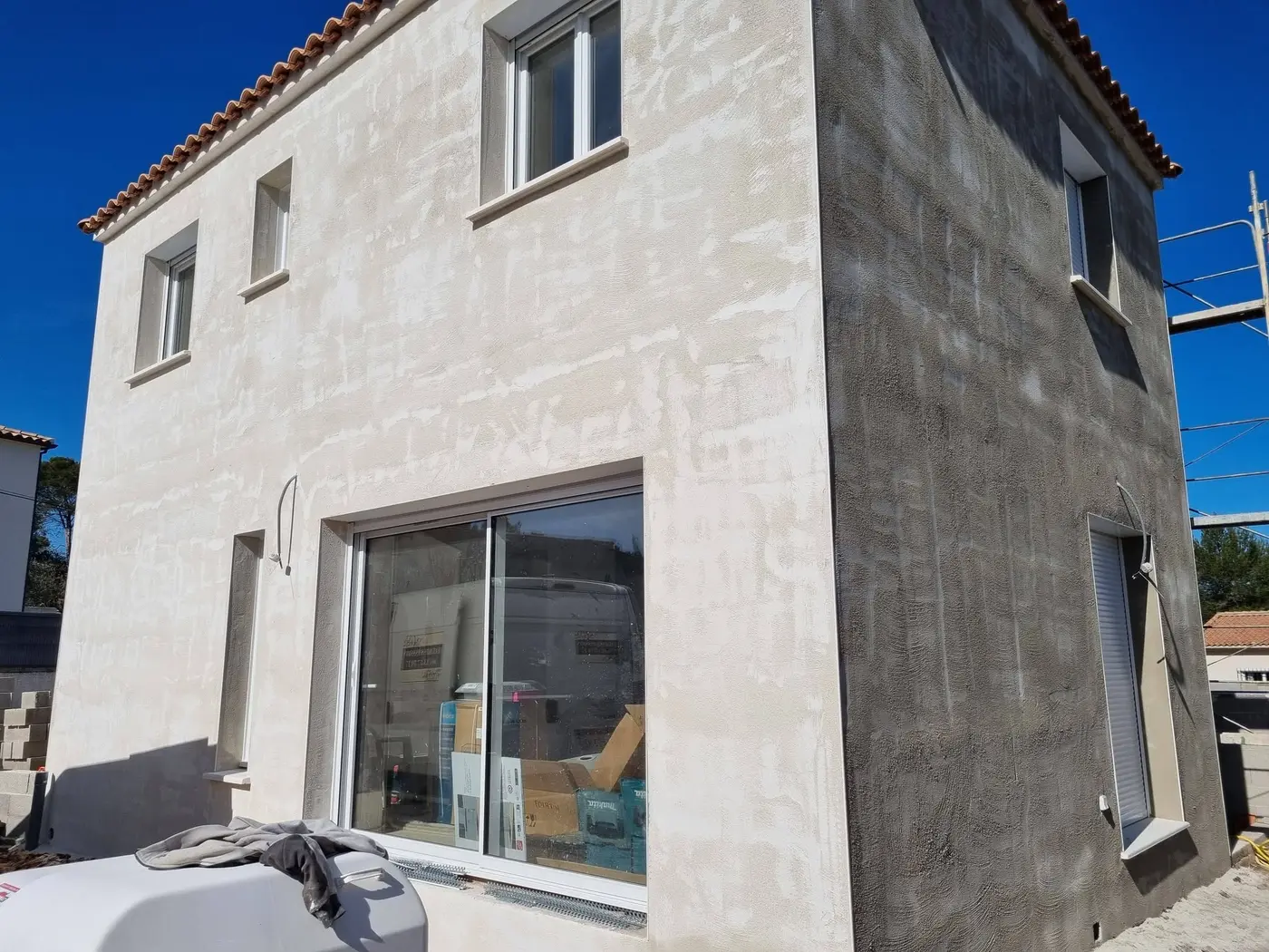 Maison neuve — enduit de finition